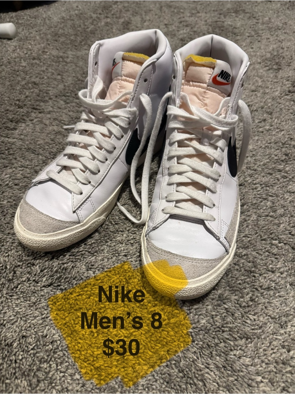 Nike White High-Top Sneakers with Black Swoosh